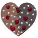 Puur en melkchocolade hart met frambozen