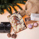 Coffret cadeau de chocolat pour Noël dans un sac en jute